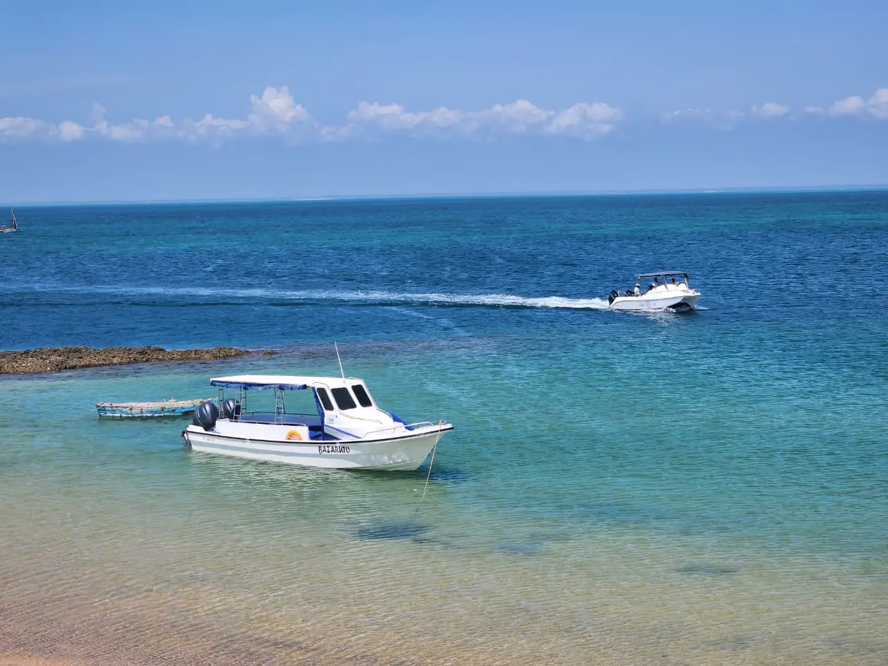 Bazaruto Island — A boat at anchor in turquoise water