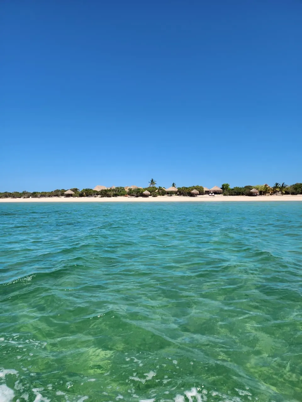 Benguerra Island — A white-sand beach seen from the sea