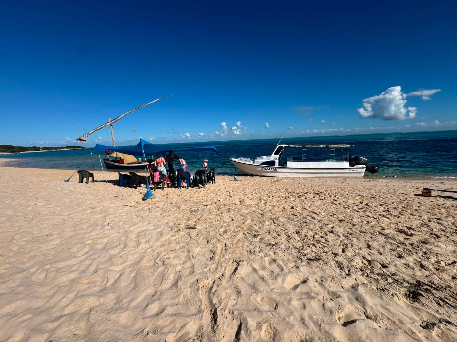 Magaruque Island — The beach, with the Bazaruto boat and a dhow